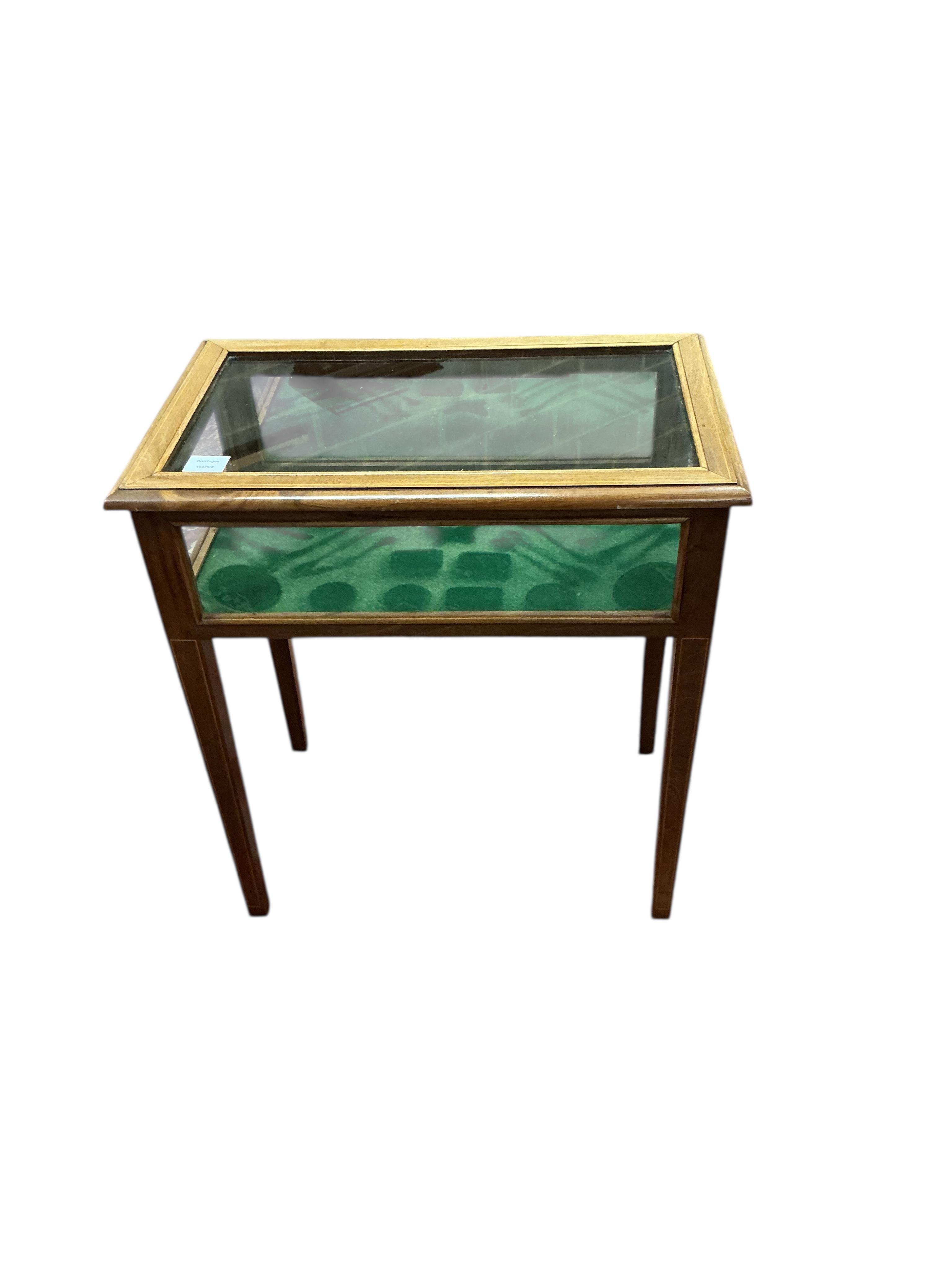 An Edwardian style rectangular mahogany bijouterie table, width 62cm, depth 38cm, height 68cm